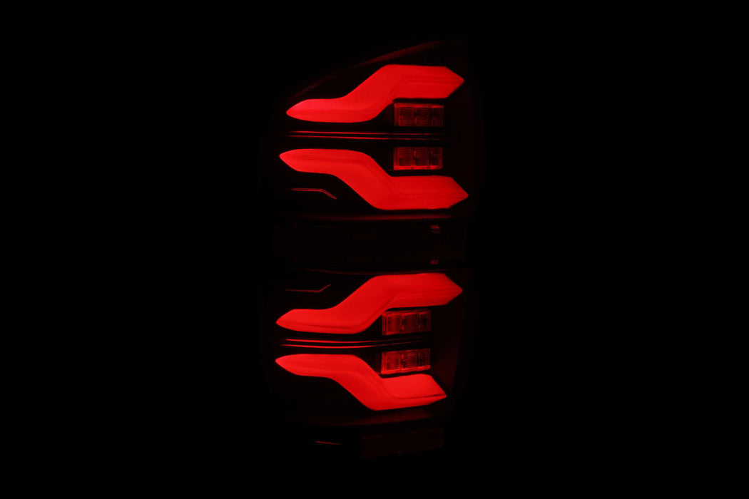 AlphaRex Luxx LED Tails: Toyota Tacoma (16-22)(Black-Red) (SKU: 680000)
